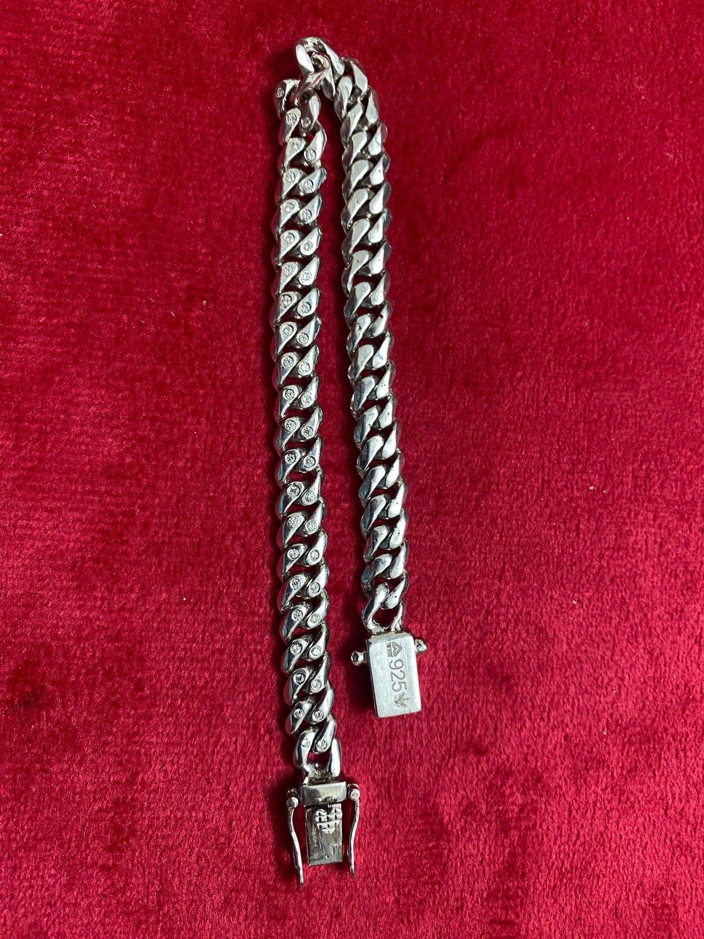 Hand made Cuban Link Bracelet Two stone per link setting Sterling Silver 925. Moissanite stone 18Karat Plated 6.5mm wide 7.5 inch length.