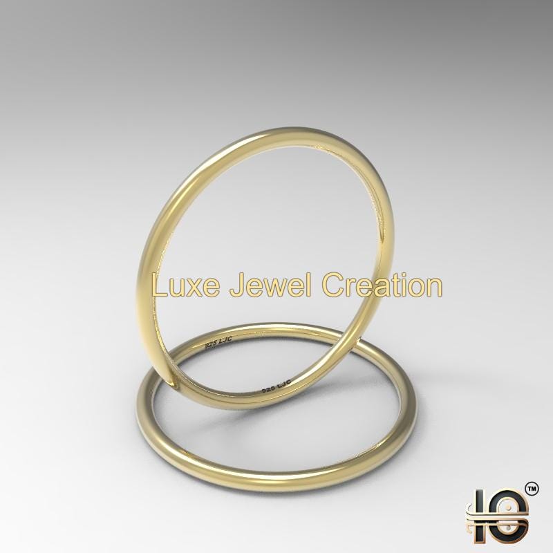 1.25mm Dainty 18 karat women's ring. Stackable ring.