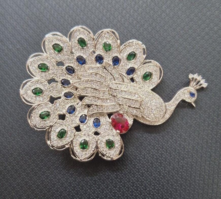 Peacock Brooch. Silver 925. 2ct Sapphire. 2Ct Emerald. 1Ct Ruby.