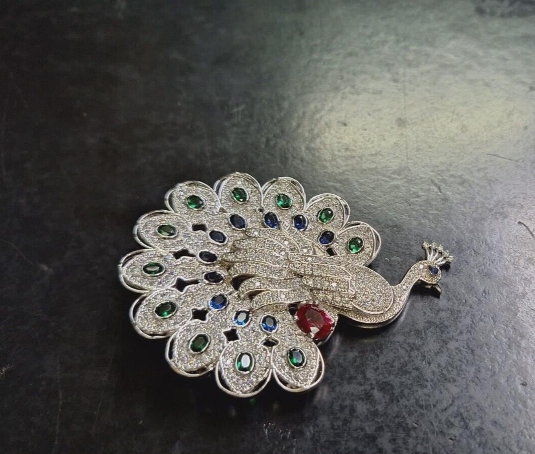 Peacock Brooch. Silver 925. 2ct Sapphire. 2Ct Emerald. 1Ct Ruby.