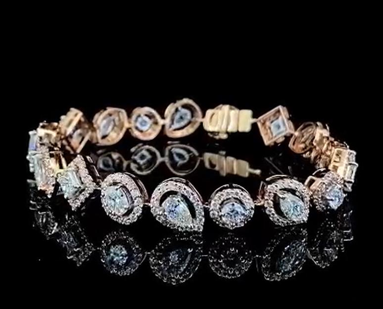 Unique Halo Multi Shape natural diamond bracelet. Solid 14 Karat. 6.5 Inch Wrist Size.