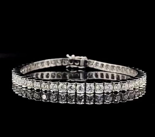 3mm Tennis Bracelet. New Prong less Design. All natural Diamond. 14 karat solid gold.
