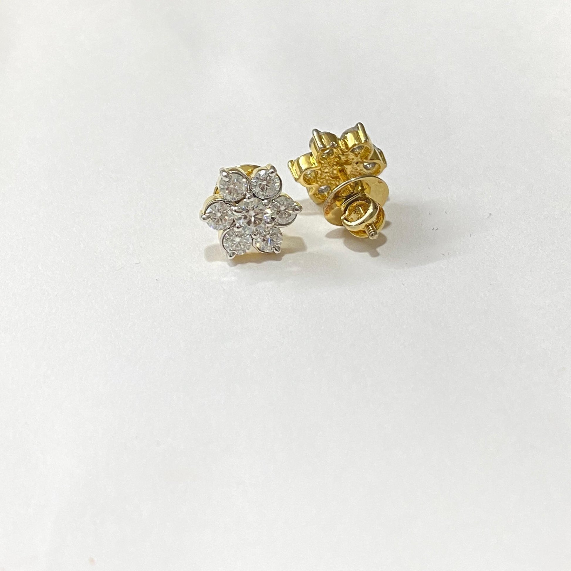 Diamond earrings. 18Karat Gold Screw back Earrings.